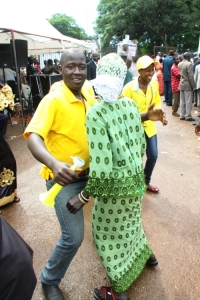 Hon. Tumusiime fan squeezing babe.