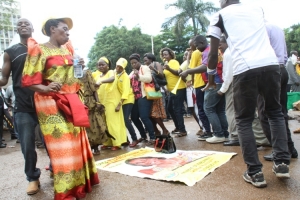 Hon. Tumusiime supporters dancing around the parliament premises.