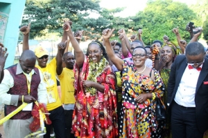 Hon. Tumusiime with her friend Peninah Kasaija feeling sweet.