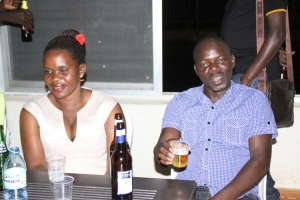 Patrick Barasa drowning in booze with unidentified babe.