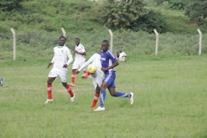 Pengere Ibrahim (in blue) scored the first goal for Entebbe FC.
