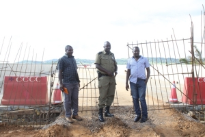 Police Boss Godfrey Ninsiima and plain cloth cops inspect the Entebbe Express Highway.