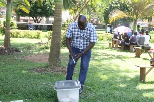 Stanley Namayirira cast his ballot at the Leisure park Kitooro polling Station.