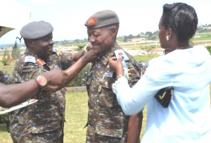 Lt Col Paul Birungi Being Decorated By Bonkmate