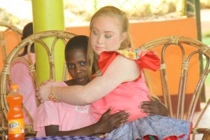 Madeline hugs her new found friend.