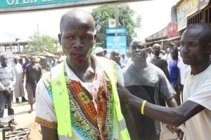 One of Kitata's boys oozing blood from the mouth after he pulped with no mercy.