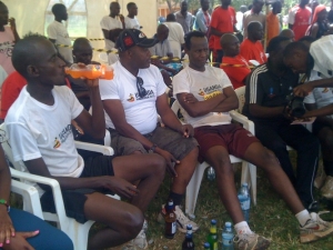 Prince Wasajja (R) with Mineral Water Bottle in his legs.