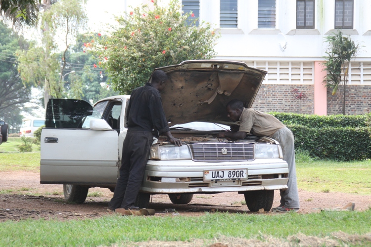 Municipal Boss Suffers With DMC Ride. Dan Fred Lutaaya's DMC ride under repair.