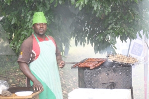 ENHAS Cargo Manager hawking roasted pork and sausages.