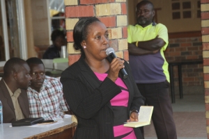 Hon. Rose Tumusiime addressing the Boda Boda riders. Shs urged them to adopt a saving culture.