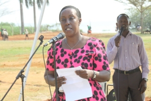 Hon. Tumusiime addressing the parents. She urged them to be responsible about their children.