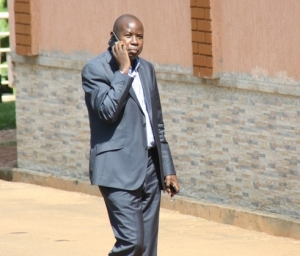 Joel Kawooya receiving lots of phone calls from babes.