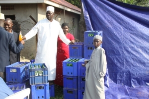Motor-mouthed NRM Chap Asuman manning the crates of Soda. All courtesy of Hon. Tumusiime.
