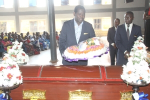 Pastor Robert Kayanja lays his wreath.