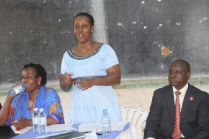 Hon. Rose Tumusiime addressing the Lake Victoria School Parents Teachers meeting.