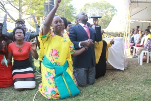 Hon. Rose Tumusiime and Tourism State Minister thanking God for her Victory.