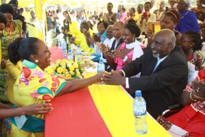Hon. Tumusiime greets her dad Robert Bikaako.