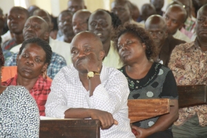 Late Okiror's friends in grief stricken mood during the St. John's Church service to pray for his soul.