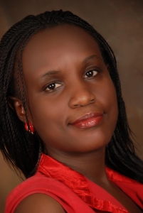 Sexy Melinda Rutebemberwa Kivumbi smiling sweet after pushing tot.