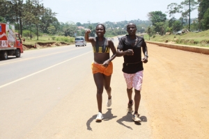 dorcus-inzikuru-with-her-trainee-nathan-kato-run-from-kampala-to-entebbe-on-tuesday-inzikuru-is-preparing-for-the-world-championships-in-london
