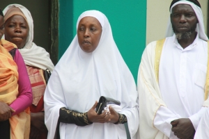 hon-tumusiime-delivering-her-remarks-after-the-eid-prayers-standing-right-is-sheikh-juma-twaha