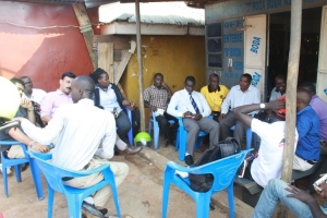 mp-tumusiimes-personal-assistant-necktie-with-several-boda-boda-riders