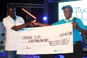 marsh-country-director-latimer-mukasa-hands-over-shs70m-cheque-to-entebbe-club-chairman-dr-twinemanzi