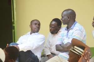 kassim-bukenya-centre-with-his-group-during-the-heated-meeting