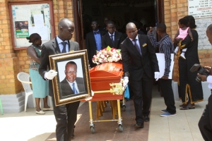 Late Dr. Abongomera's casket leaves Bugonga Catholic Church after the Requiem mass.