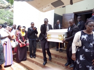 a-plus-funeral-service-carry-late-dr-miiros-casket-into-the-van