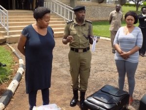 Afande Emilliane Kayima parades two female drug traffickers at the Entebbe Airport  Aviation Police head quarters at who were arrested with illegal possession of narcotic drugs in November 2016. 
