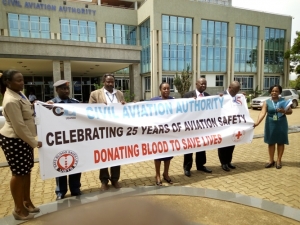 hon-rose-tumusiime-with-caa-management-display-a-banner-to-officially-launch-the-blood-donating-campaign
