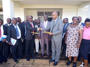 vincent-rubarema-handing-over-to-pius-wakabi-as-agric-minister-vincent-ssempijja-looks-on