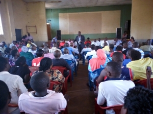 Kitooro market Vendors listen to Mayor Kayanja during a consultative meeting on Thursday.
