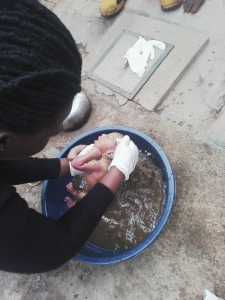 Good Samaritan cleans the baby.