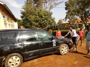 Kintu Salim in a car washing exerice to raise funds and resources for their fellow HIV/AIDS afflicted colleagues.