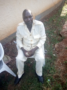 Mugerwa Abbas smiling sweet after kicking Poverty out of his life.