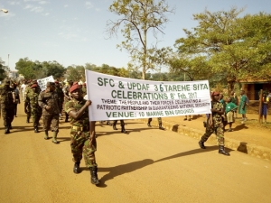 Soldiers from the SFC, Airforce and Police marching in Entebbe Town during the Tarehe Sita Celebrations.