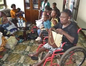 Councilor Modesta Tezikyabbiri (R) In Group Photo With Kids With Disabalities
