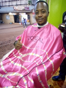 Ex-MP Aspirant Wakaimah shaving off his hair.
