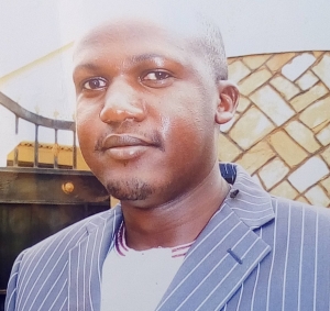 Balinda Ismail breathing behind bars in Nairobi, Kenya where he was arrested.