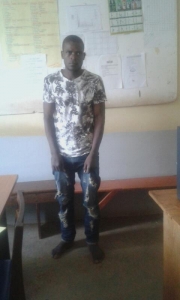 Oscar Mubiru alias Edirisa at Entebbe Police Station after he was arrested.
