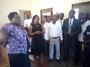 RDC Kirabira (L) grilling Kasanje Town Council Bosses during the tour of the Health centre.