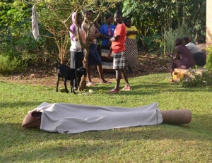 Body rolled in a mat(photo by Luwemba)