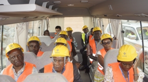 CAA Board members in a van inspecting some of the ongoing works at Entebbe Airport.