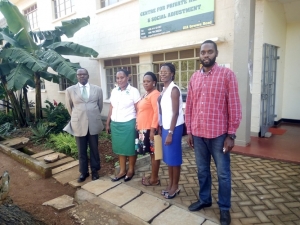 Dr. Benon Biryahwaho (extreme left) while Dr. Vennie Mbazira is second from right. Others are Dr. Benon's staff.