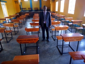 Lake Victoria School Head master officially received the desks from Melchizedek club on Wednesday.