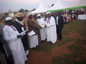 NRM Secretary General Ssefunka Tamuzadde received the certificate on behalf of Ex Mayor Kabuye Stephen.