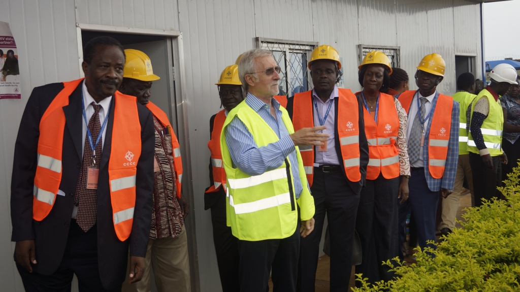 One of the Consultants on the works project shares a moment with the Board Members.