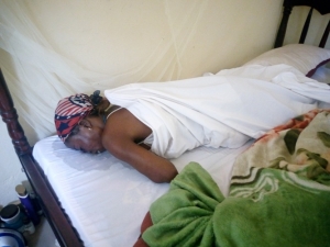 The deceased discovered dead in bed.